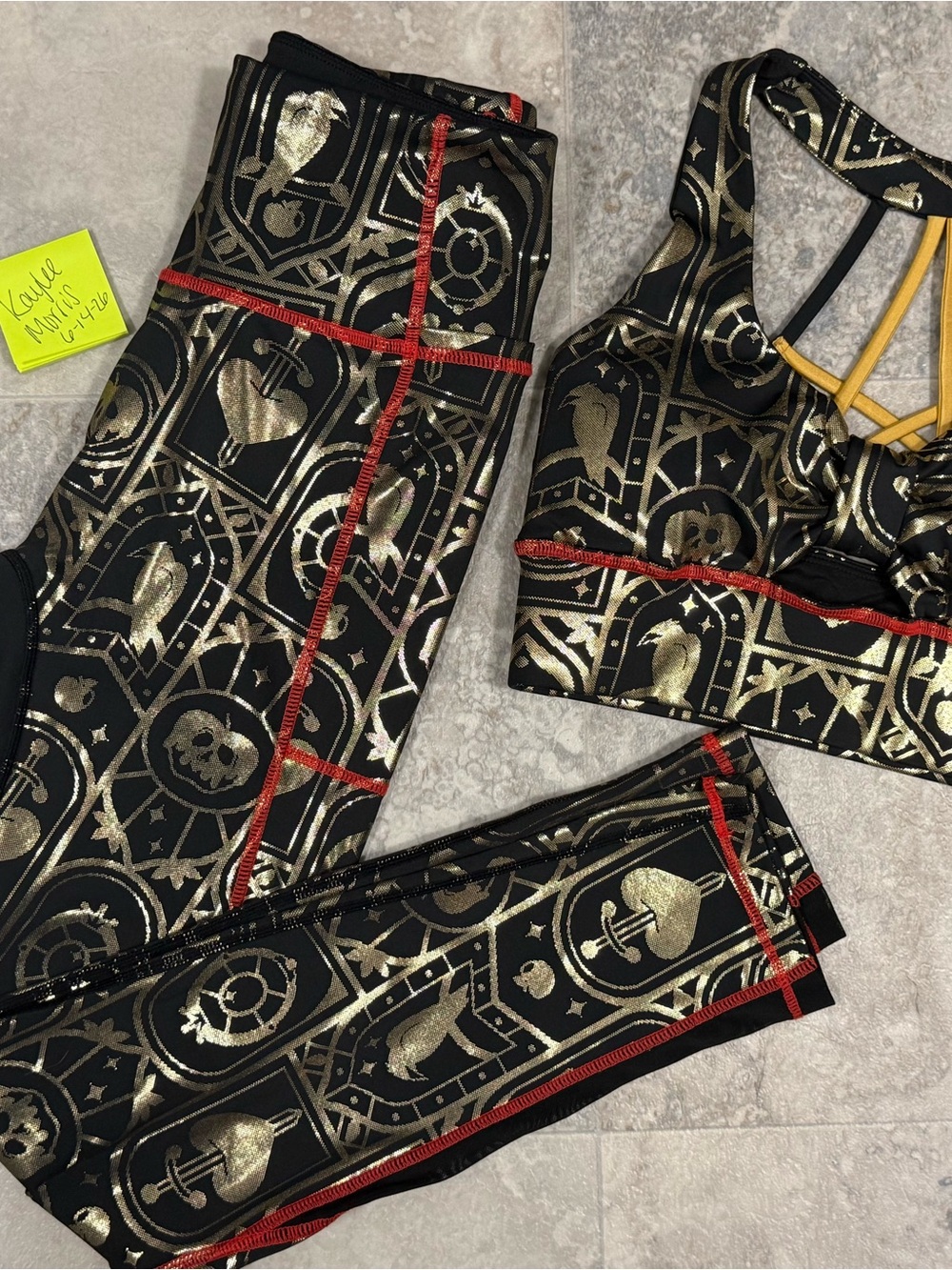 Crowned Athletics positioned heart leggings and bra